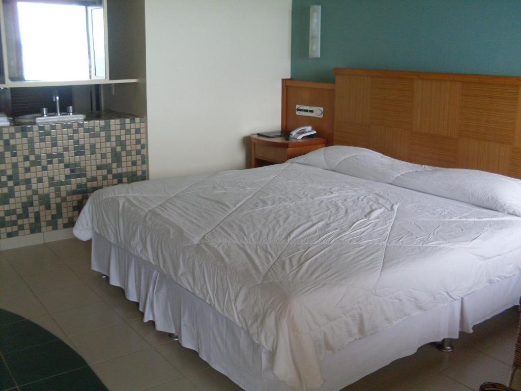 Hotel Porto Do Sol Guarapari Quarto foto